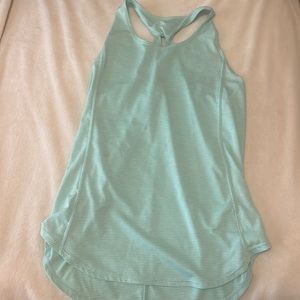 striped light blue champion tank top with a strap cross in the back.